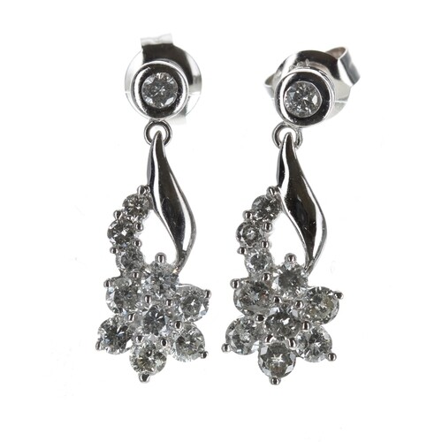 Pair of 18ct white gold daisy style diamond cluster earrings...