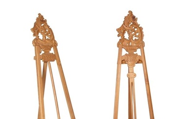 Pair of French Rocaille Carved Cherrywood Art Easels, 20th c., the pierced rococo acanthus carved