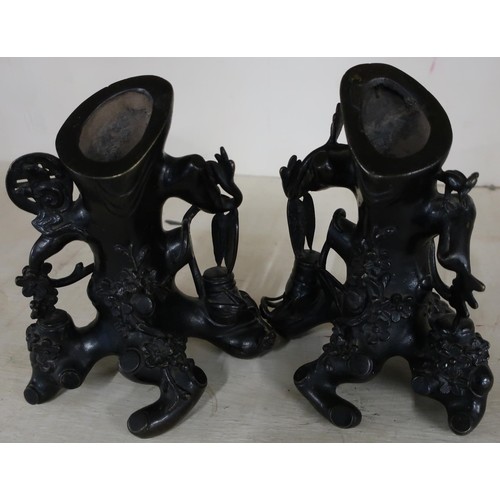 Pair of Japanese bronze stump vases, stylised in the form of...