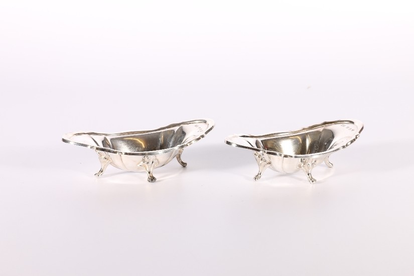 Pair of Victorian silver dishes of oblong boat shape raised ...