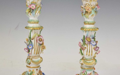 Pair of early 20th century Continental flower-encrusted candlesticks