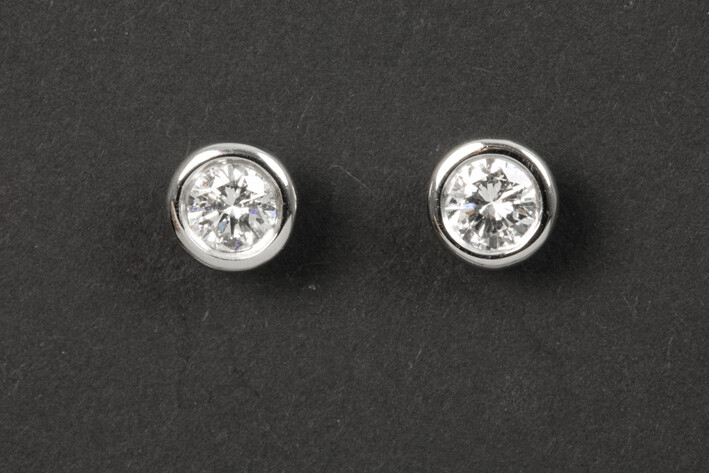 Pair of earrings in white gold (18 carat)...