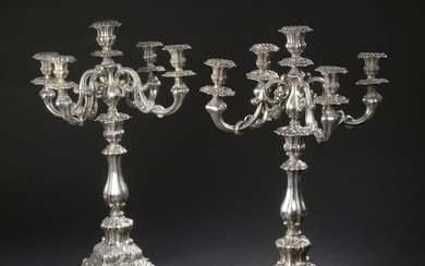 Pair of candelabra with large bunch of five silver repoussé...
