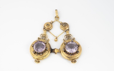 Pendentif formé de deux pendants d'oreille en or jaune (750) constitué de deux ronds reliés...