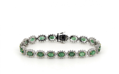 Platinum 950, Emerald and Diamond, Halo Line Bracelet. The design...