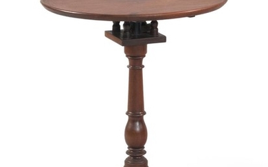 QUEEN ANNE-STYLE BIRDCAGE TILT-TOP TABLE In mahogany, with dish top, turned pedestal, and cabriole legs ending in snake feet. Height...