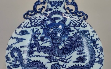 Qing Dynasty Qianlong period blue and white cloud dragon pattern double-handled moon-embracing vase