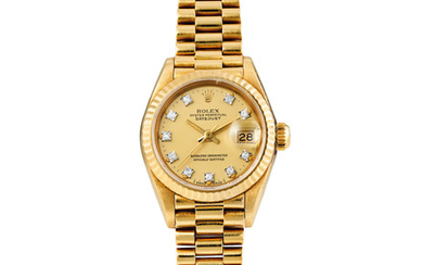 Rolex. A Lady's Yellow Gold Wristwatch with diamond indexes, Bracelet and Date