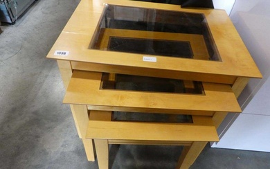 Rubber wood nest of 3 glass top coffee tablesCondition Report...