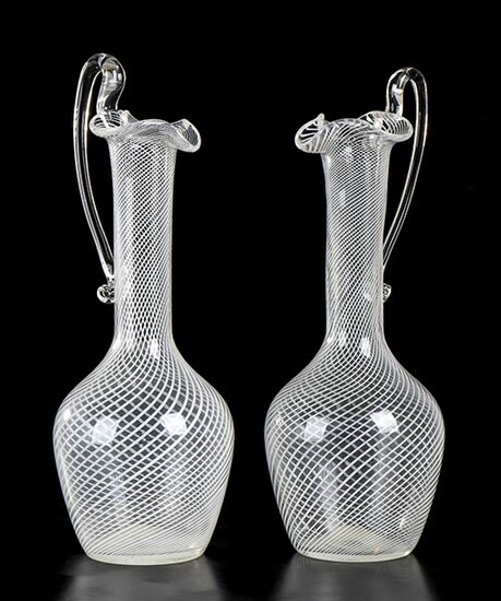 SALVIATI Two jugs, reticello technique Glass, 16 x 10 cm...