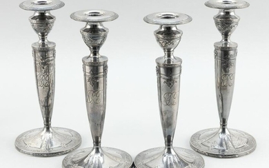 SET OF FOUR WEIGHTED STERLING SILVER CANDLESTICKS 20th