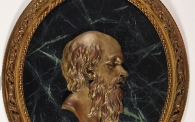 Socrates and Plato. 19th c 2 gilt plaster bas-relief, on wooden oval with imitation marble,...