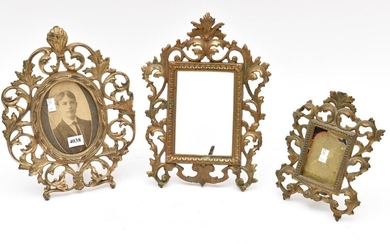 THREE ORNATE GILDED BRASS PICTURE FRAMES, 19TH CENTURY, THE LARGEST 30CM HIGH