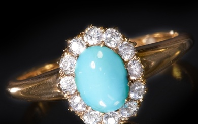 TURQUOISE AND DIAMOND CLUSTER RING. 18 ct. yellow gold Set w...