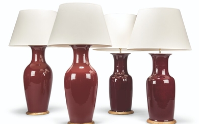 TWO PAIRS OF CHINESE SANG-DE-BOEUF VASES, MOUNTED AS LAMPS