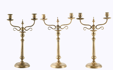 Three brass candelabra, probably Skultuna Bruk, No 50, 19th century.