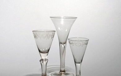 Three wine glasses c.1730-40, one with a drawn trumpet bowl...