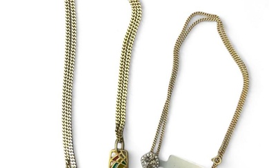 Two pendants and chains. Featuring a 9ct yellow gold Diaspore...