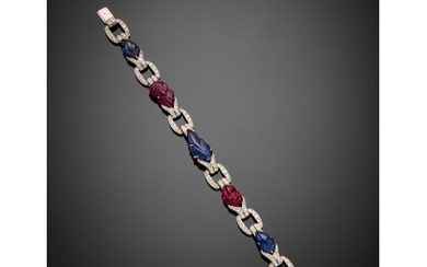 White gold diamond bracelet with carved ruby and sapphire spacers, diamond in all ct. 3 circa, g 27.66 circa, length...