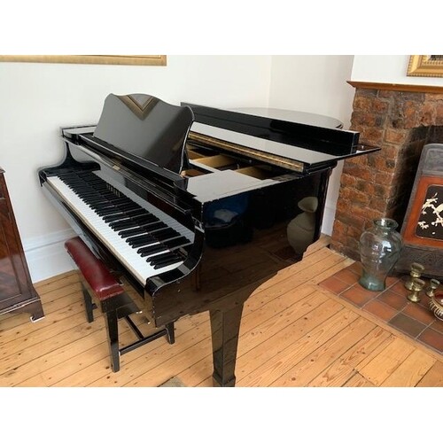 Yamaha (c1974) A 6ft 1in Model C3 grand piano in a bright eb...
