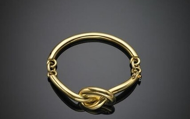 Yellow gold articulated knot bracelet, g 29.20 circa