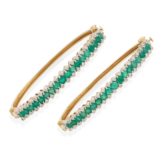 a pair of 14k gold, emerald and diamond bangles