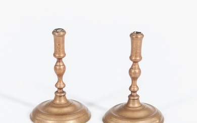 Pair of Brass Tapersticks, England, 18th century, with knopped stems and round bases, ht. 4 1/4 in.