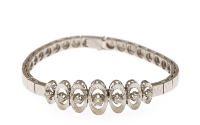 A diamond bracelet set with seven brilliant-cut diamonds mounted in 18k partly satinated white gold. L. 18 cm.
