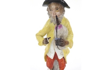 19th century continental porcelain monkey musician, 15cm hig...