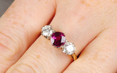 An 18ct gold Thai ruby and brilliant-cut diamond three-stone ring.
