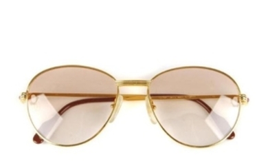 CARTIER - a pair of rose tinted sunglasses. Featuring