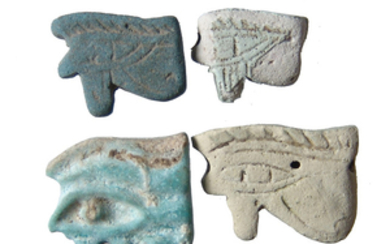 A group of 4 Egyptian faience Eye of Horus amulets