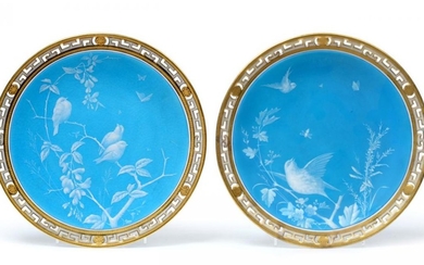 A Pair of Minton Plates, circa 1870, decorated with birds...