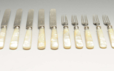 A set of Edwardian and later matched silver and mother-of-pearl handled fruit knives and forks for six place settings.