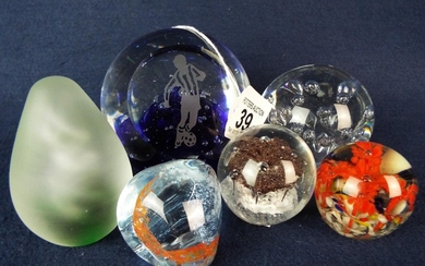 Six controlled bubble paperweights.