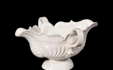 A Staffordshire salt-glazed stoneware two-handled double-spouted sauceboat
