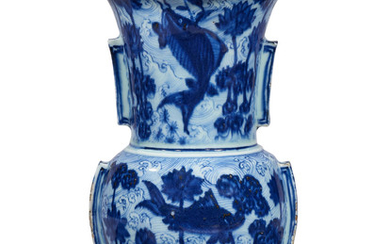A very rare blue and white 'fish and lotus' vase, zun