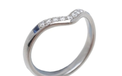 A diamond and sapphire wishbone ring