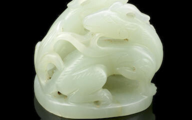 A pale green jade 'mythical beast' finial