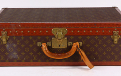Louis Vuitton Azler hard shell suitcase, with signature monogrammed canvas body, continuous LV monogram leather edges, brass corner...