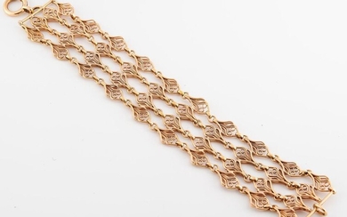 * 750 °/°° gold ribbon bracelet with filigree links.