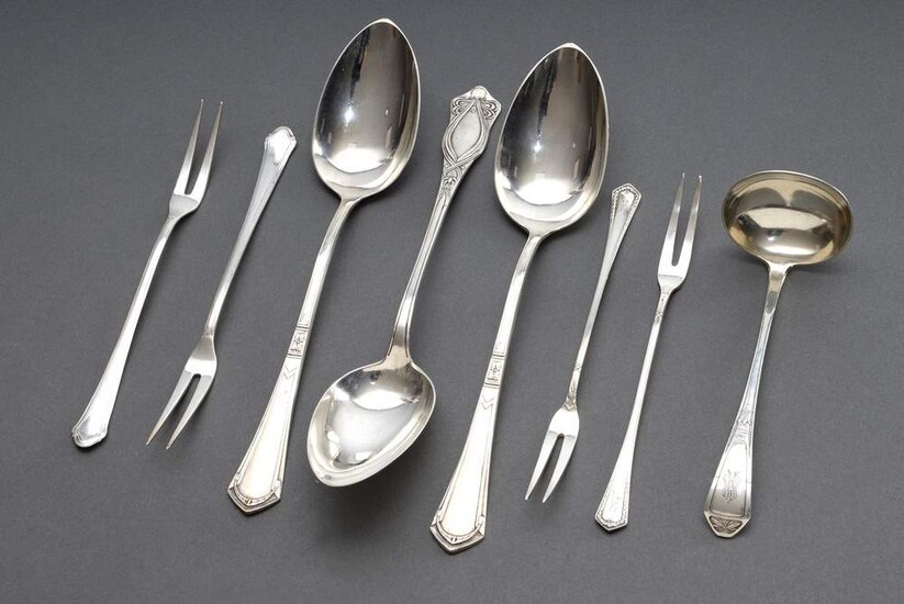 8 Various pieces of Wilhelminian and Art Nouveau serving cutlery with different decorations, 3x with monogram engraving, maker a.o. Bruckmann &Söhne, Bremer Silberwarenwerkstatt, c. 1900, silver 800, 458g: 3 large spoons, 4 meat forks and 1 sauce...