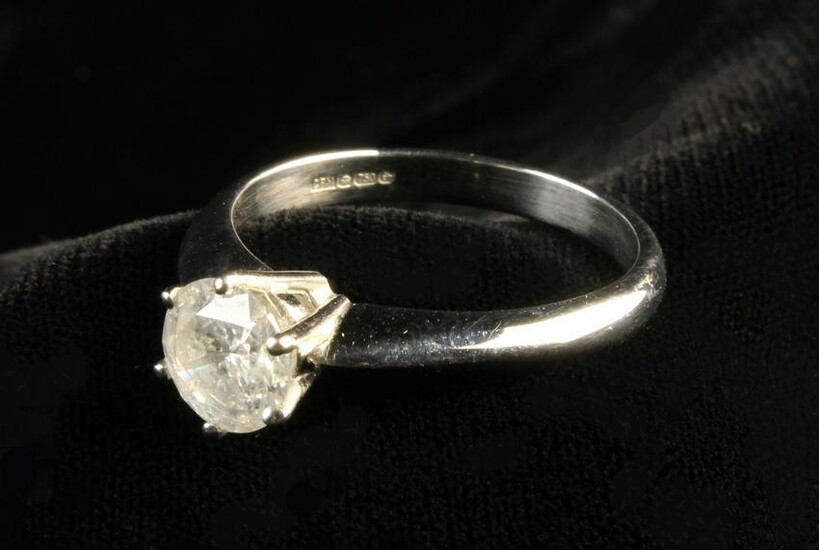 An 18 Carat White Gold Solitaire Diamond Ring. The
