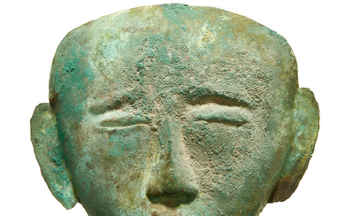 A gilt copper alloy funerary mask