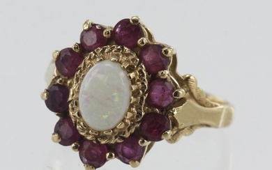 9ct yellow gold ruby and opal cluster ring, one cabochon opa...
