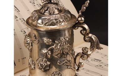 A 19th century Austrian silver tankard, chased with stylised...