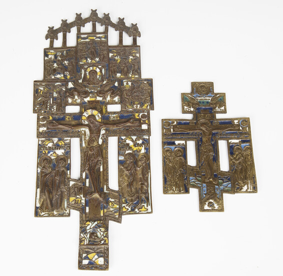 A 19th century Russian cast brass and enamelled icon, incorporating a central crucifix surrounded by