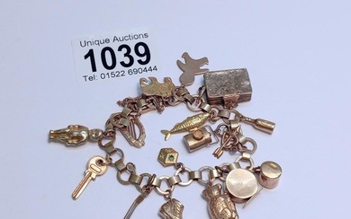 A 9ct gold charm bracelet, most charms marked, some unmarked...