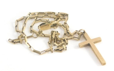 A 9ct gold crucifix pendant and chain, the crucifix...