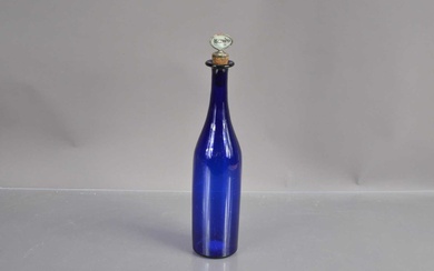 A 'Bristol Blue' glass bottle-shape decanter with silver plated 'Brandy' label stopper